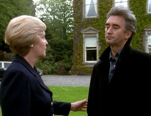 Harriet and John on the lawn of the residence