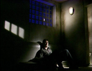 Eddie spends the night in a police cell.